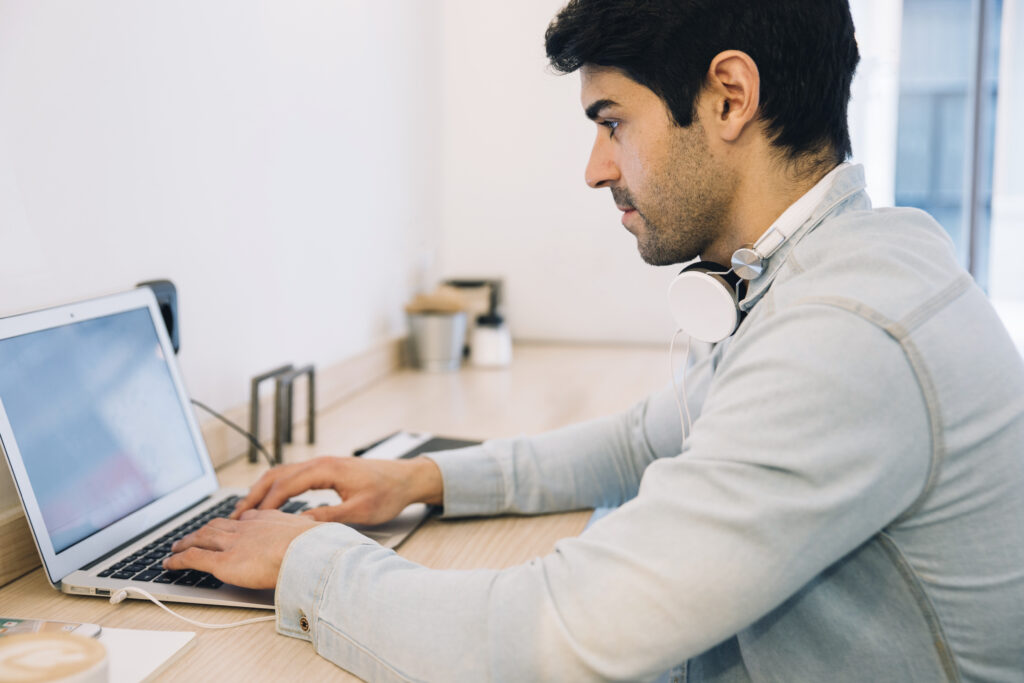 A man working on a certified spanish translation.